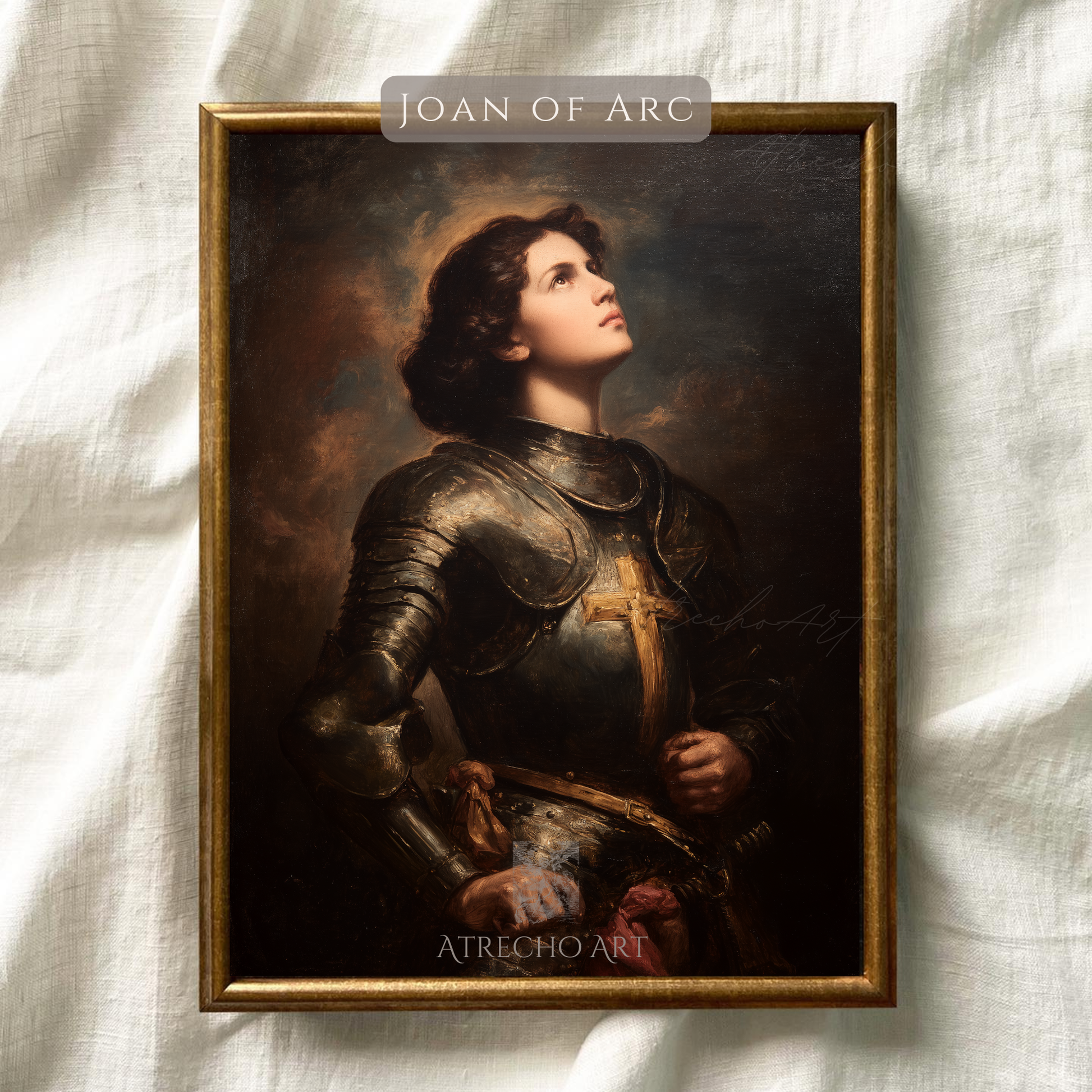 (03 texture) Close-up of the Joan of Arc print showing matte linen paper texture and gilded cross detail, by Atrecho Art