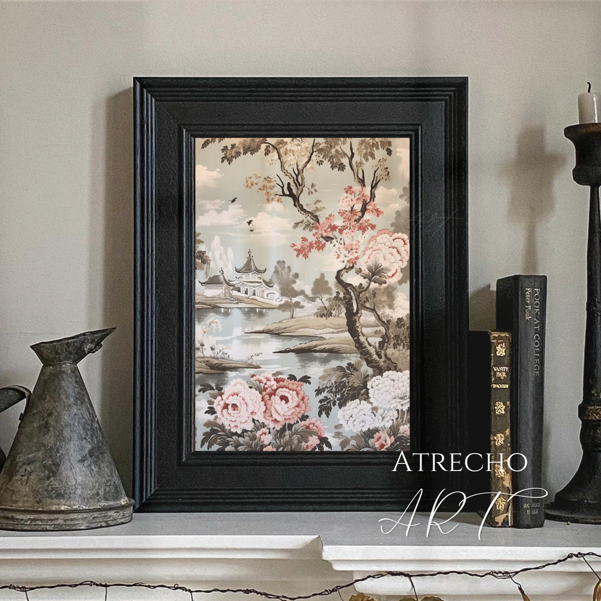 Framed chinoiserie pagoda print styled above a console with books and candles, by Atrecho Art