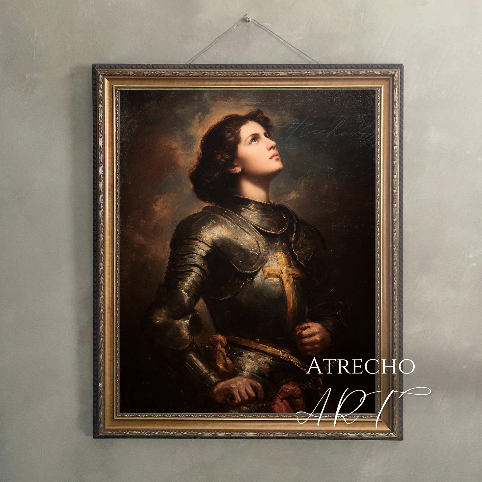 (06 hanging) Joan of Arc print hung above a reading chair, wrought iron frame anchoring an Old World gallery wall, by Atrecho Art